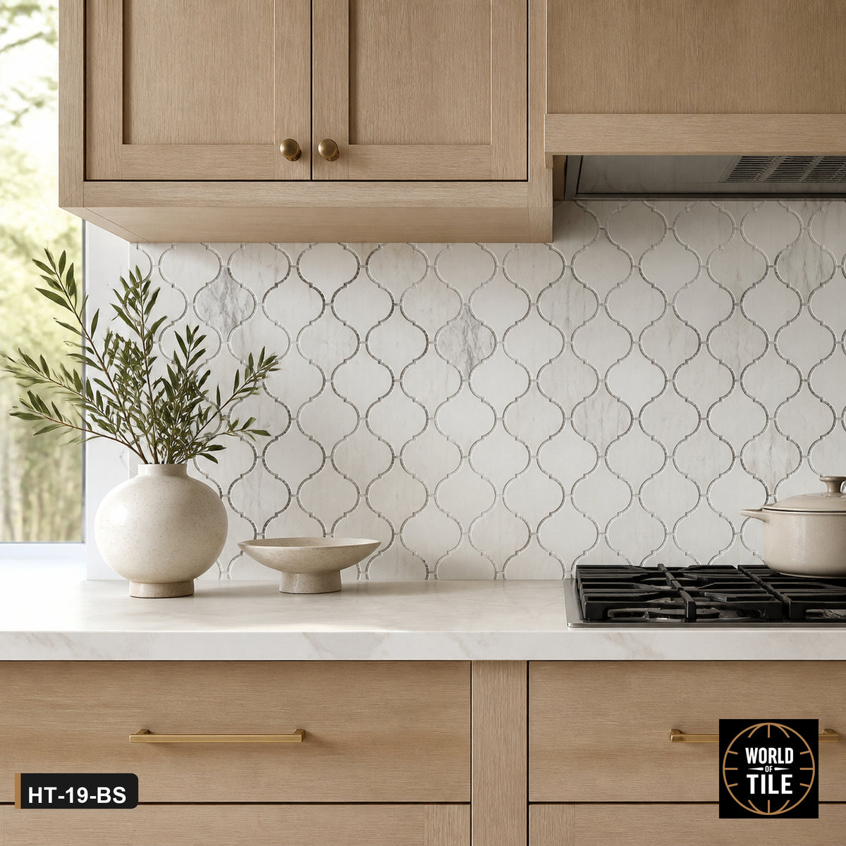 Carrara Marble Arabesque Mosaic installed as a kitchen backsplash