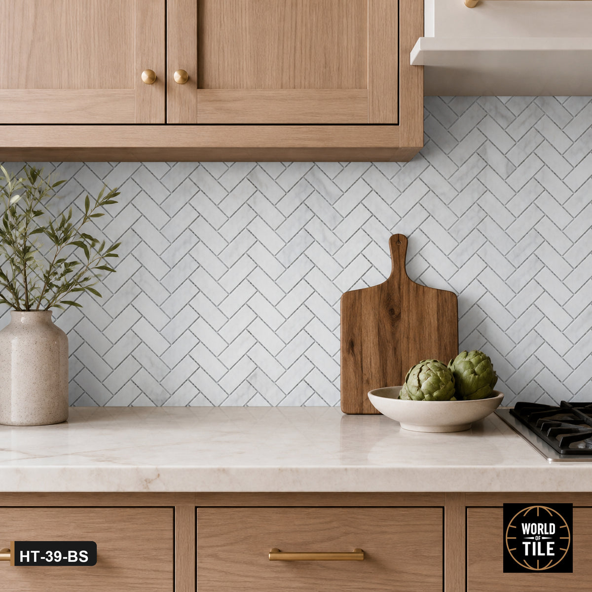 Carrara Marble Herringbone Mosaic installed as a kitchen backsplash