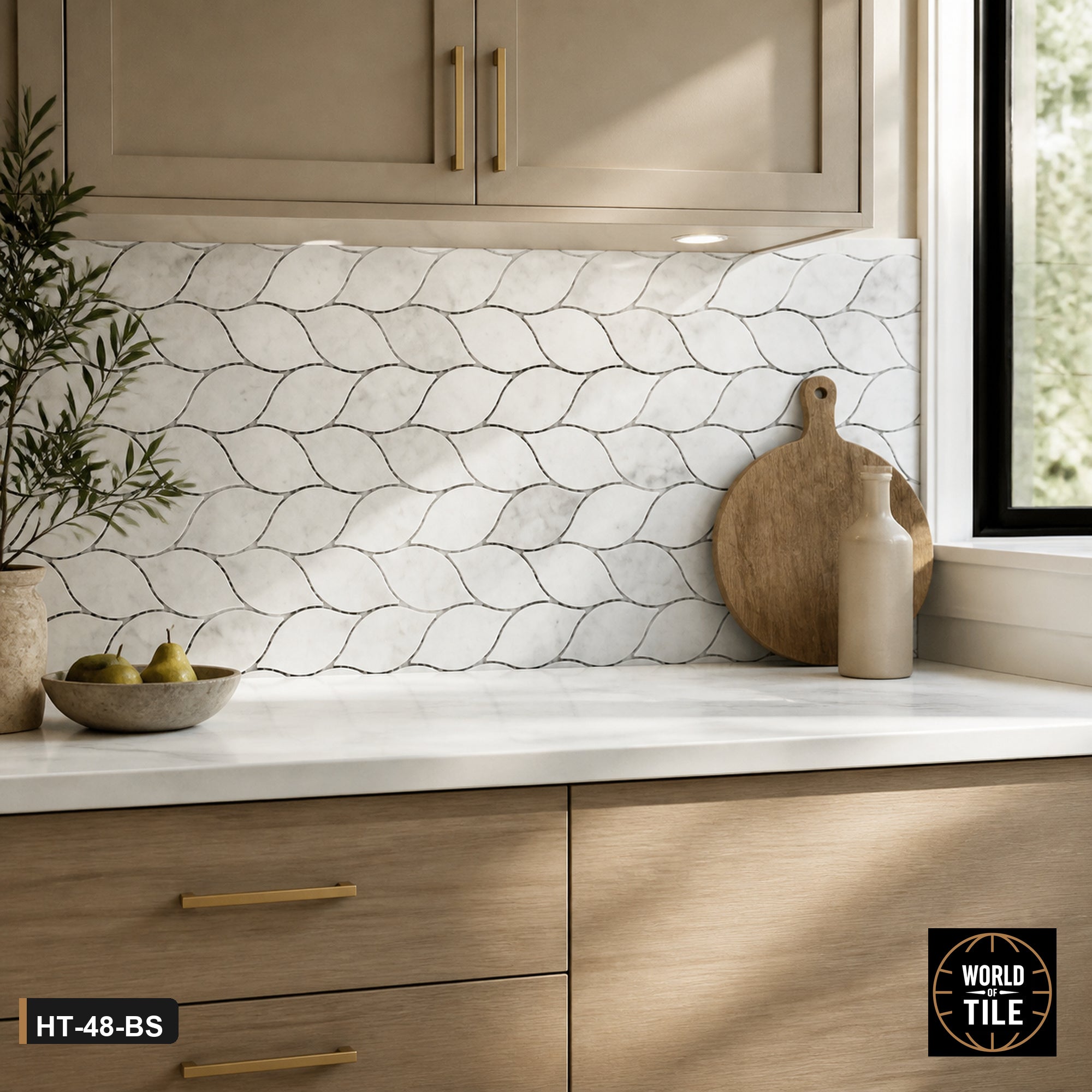 Carrara Marble Leaf Mosaic installed as a kitchen backsplash