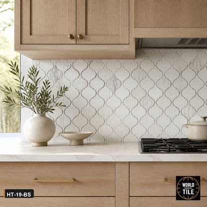 Carrara Marble Arabesque Mosaic installed as a kitchen backsplash