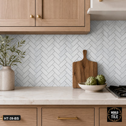 Carrara Marble Herringbone Mosaic installed as a kitchen backsplash