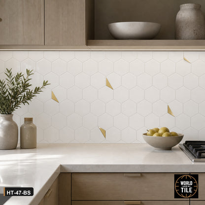 White Marble Hexagon Mosaic with Gold Accent installed as a kitchen backsplash